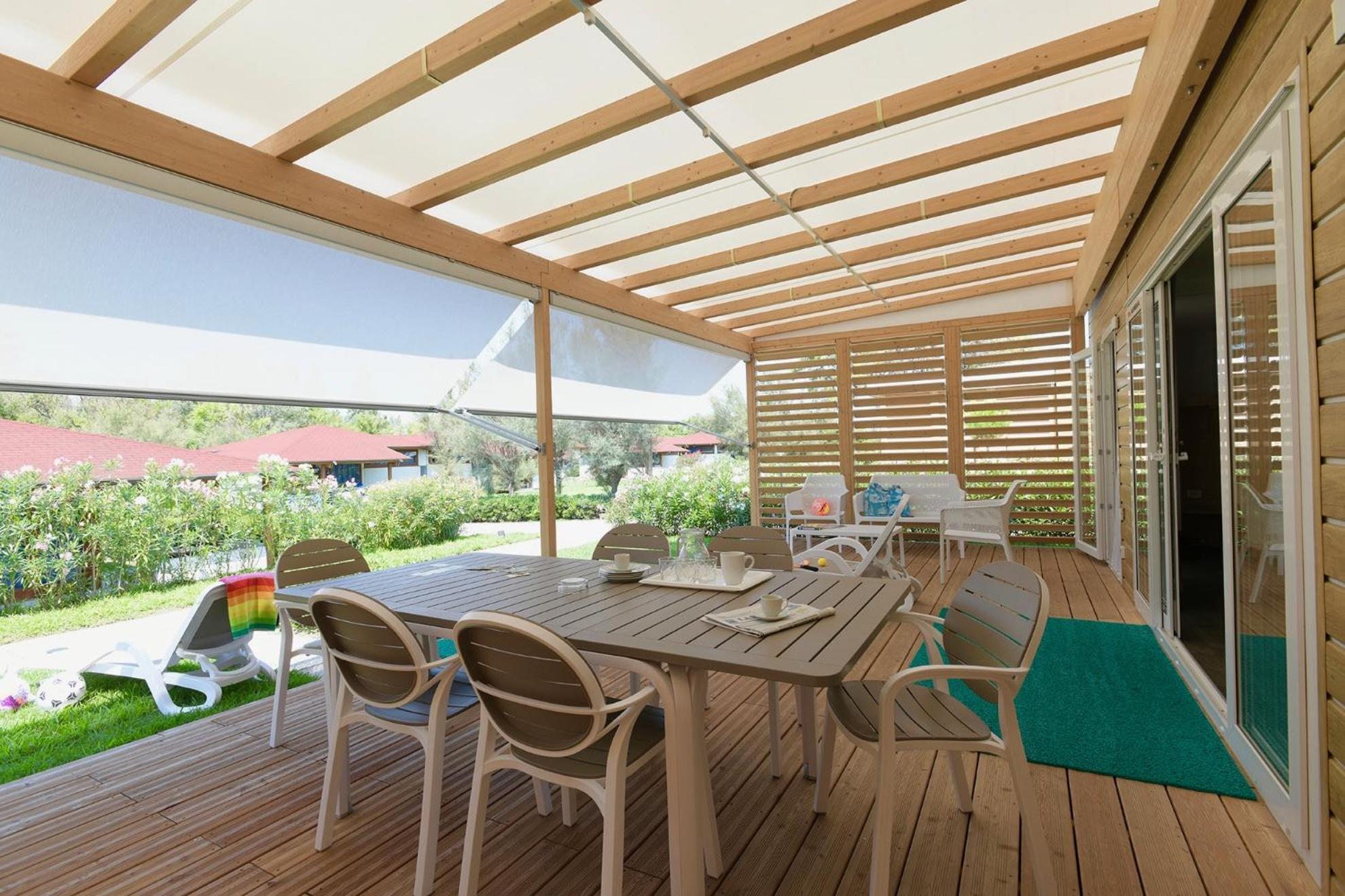 Isamar Holiday Village Ca Lino Kamer foto A pergola with a retractable awning